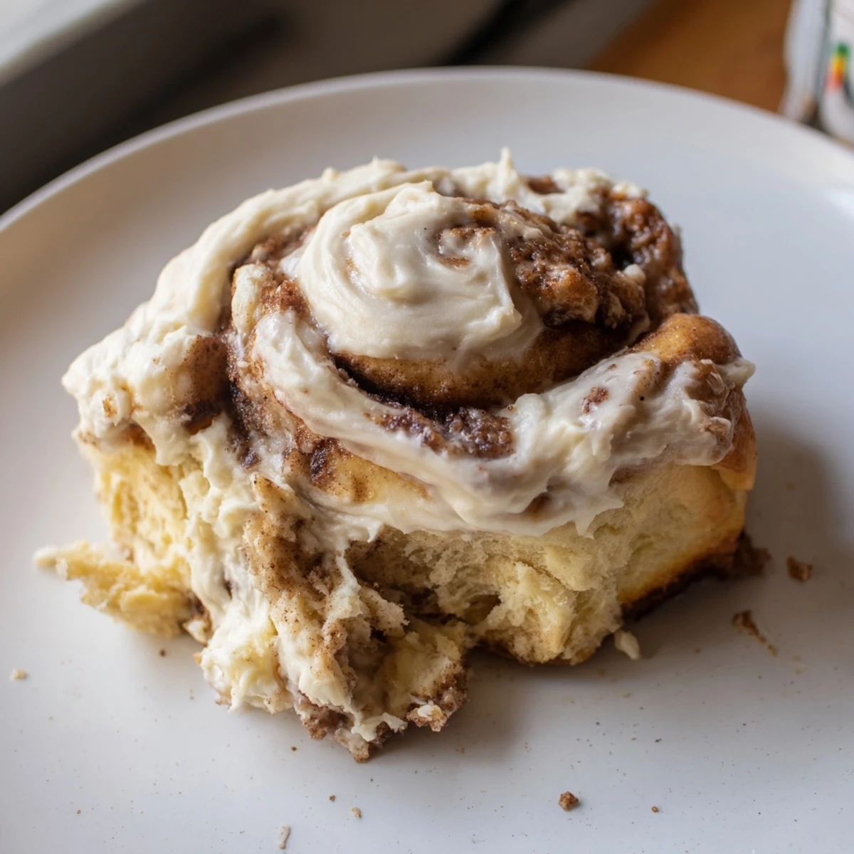 Warm Keto Cinnamon Buns arranged on a plate with a side of black coffee for a low-carb treat.