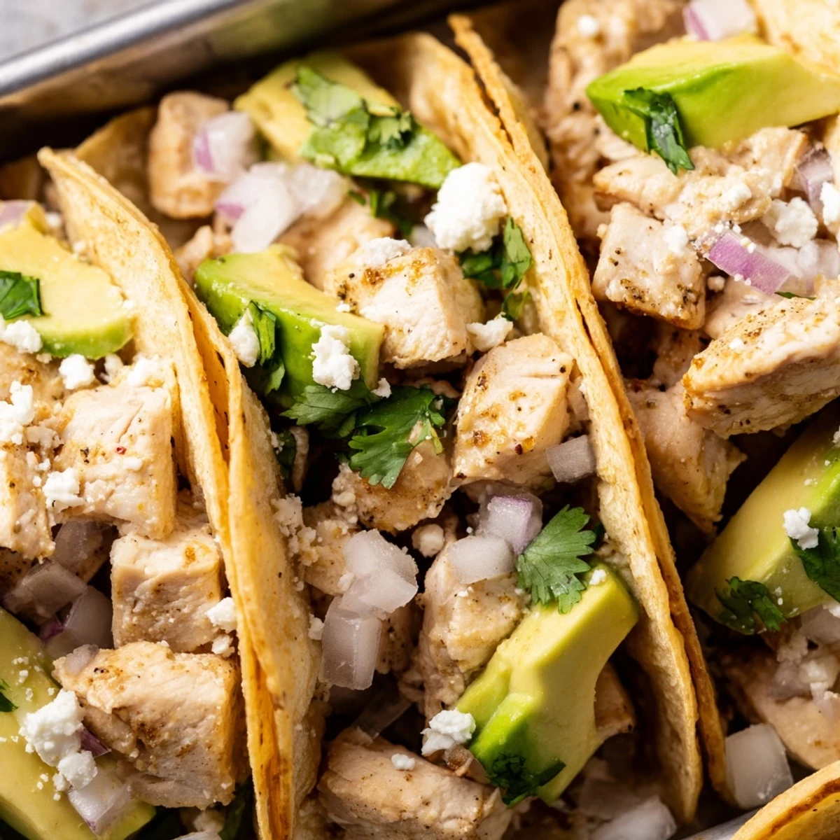 Tender marinated chicken and fresh cilantro in warm corn tortillas for easy Chicken Street Tacos.