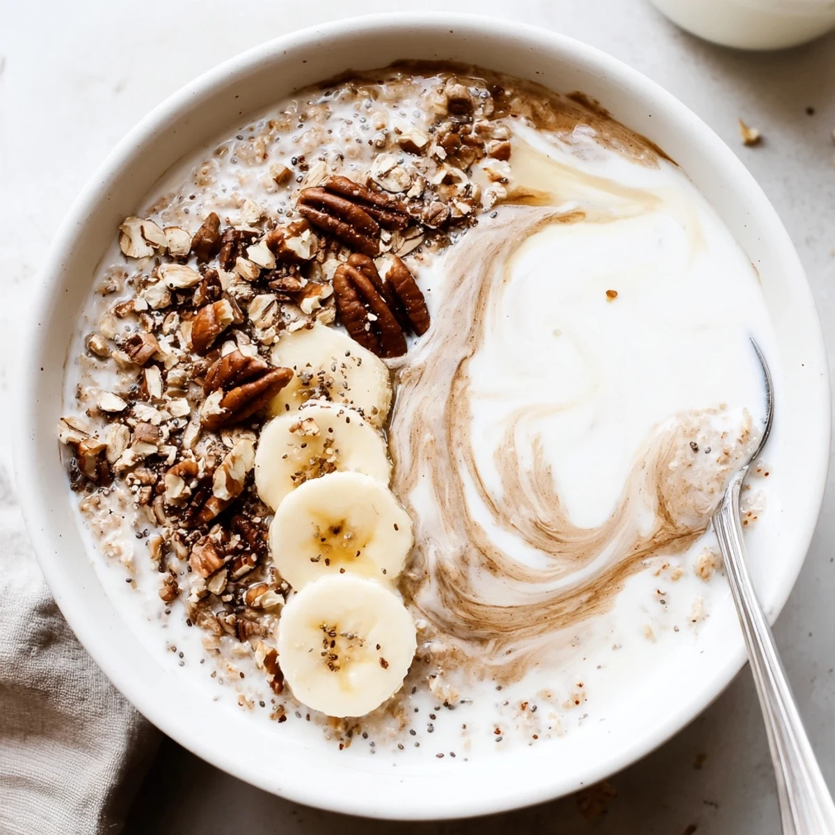 Chilled Brown Sugar Coffee Overnight Oats with velvety texture and maple drizzle