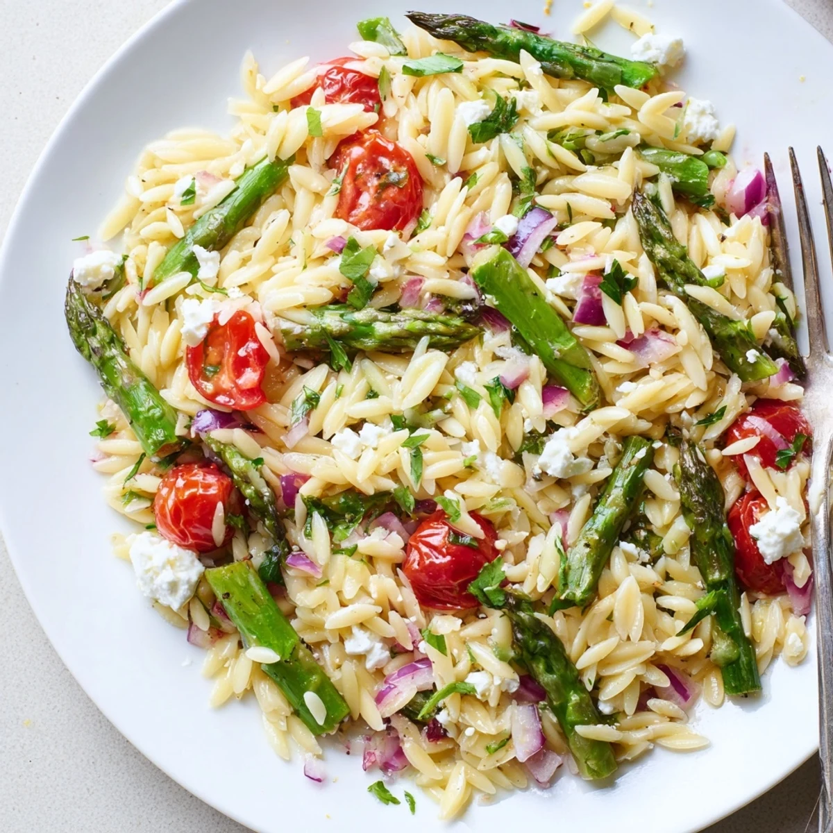 Simple Asparagus Orzo Salad With Lemon Vinaigrette served chilled, bright lemon aroma